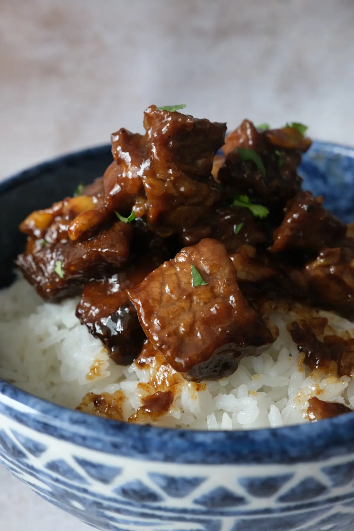 Garlicky Filipino beef salpicao served over fluffy white rice.
