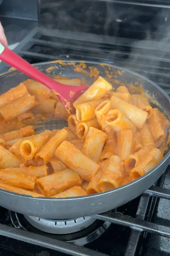 Rigatoni tossed in creamy gochujang sauce until evenly coated.