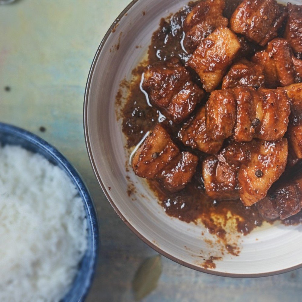 Filipino pork adobo with rice on the side