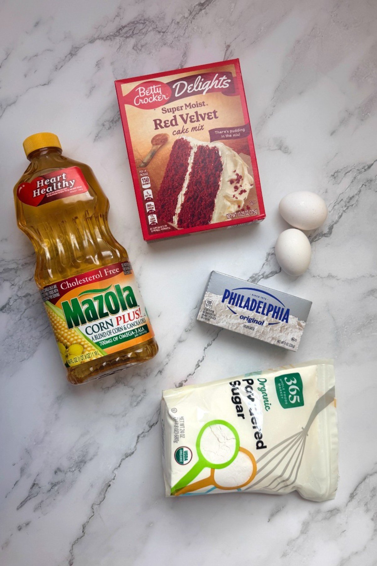 Ingredients for Stack of red velvet brownies: red velvet cake mix, oil, eggs, cream cheese, powdered sugar