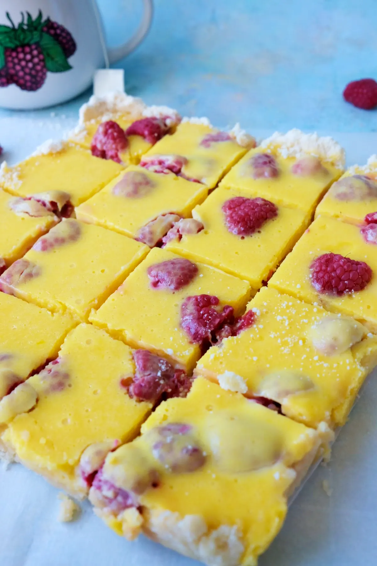 Rasperry lemon bars sliced into squares, close-up