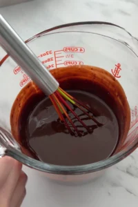 Thick chocolate mixture after combining melted ingredients