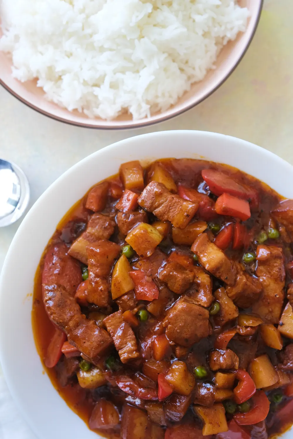 pork menudo with rice on the side