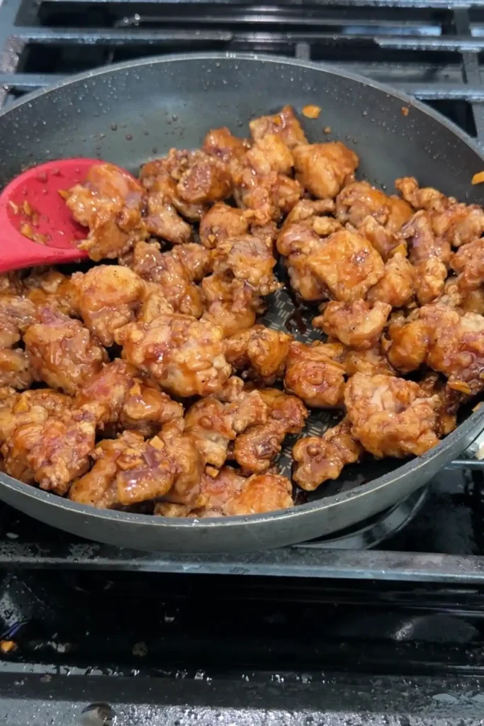 Chicken coated in glossy honey garlic sauce