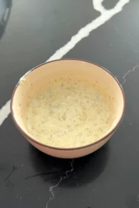 Creamy homemade tartar sauce mixed and ready to serve.