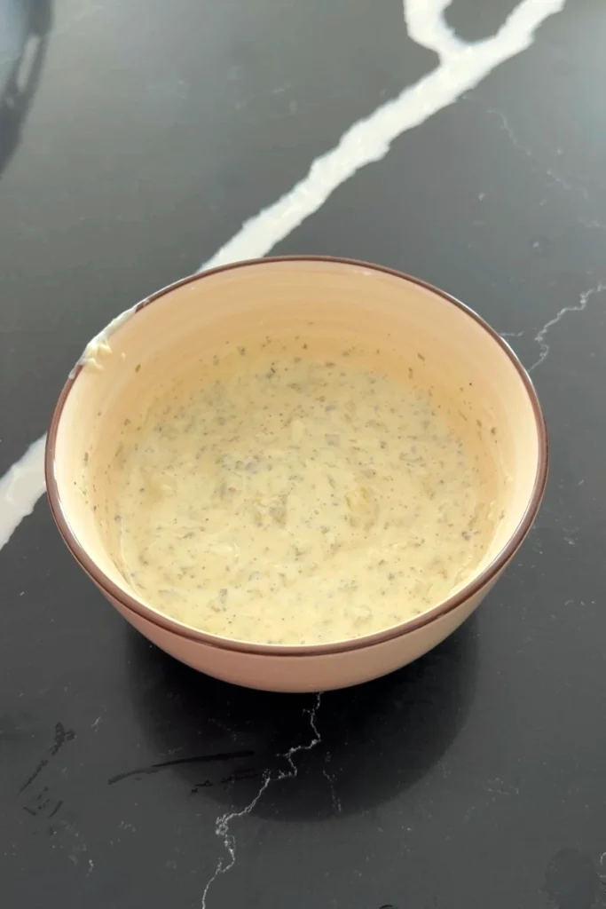 Creamy homemade tartar sauce mixed and ready to serve.