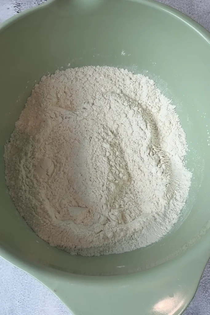 Dry ingredients mixed together in a bowl for crispy fish coating