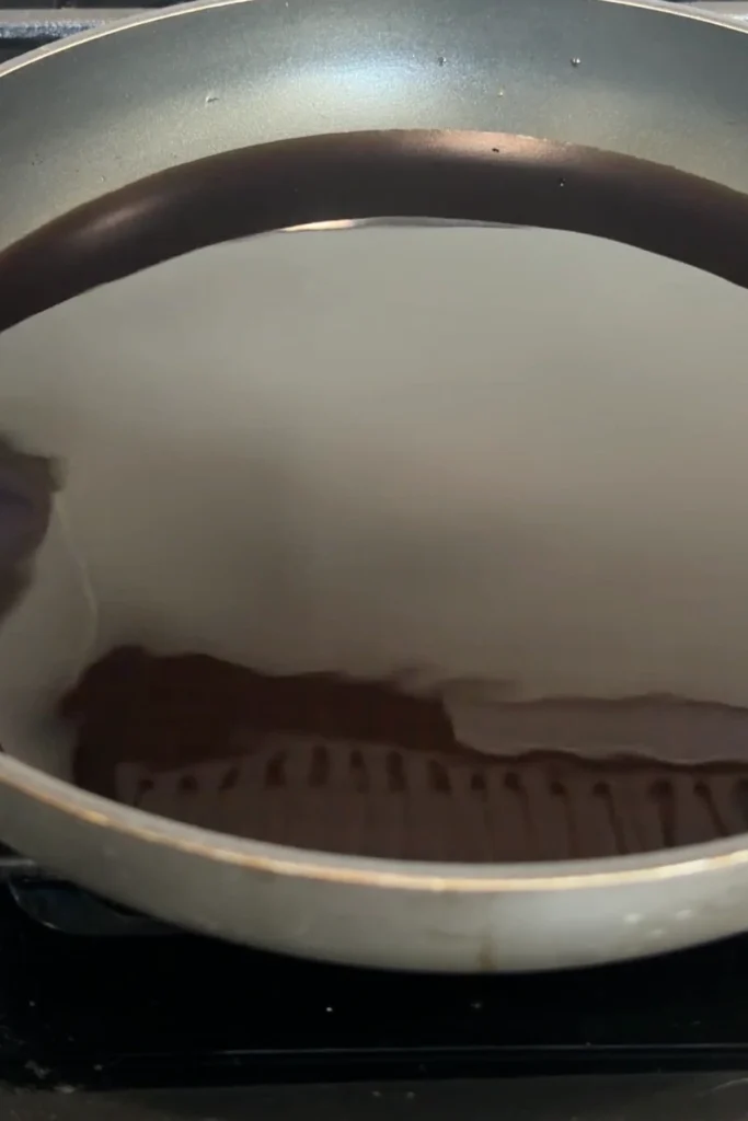 Dashi-based sauce in a pan.
