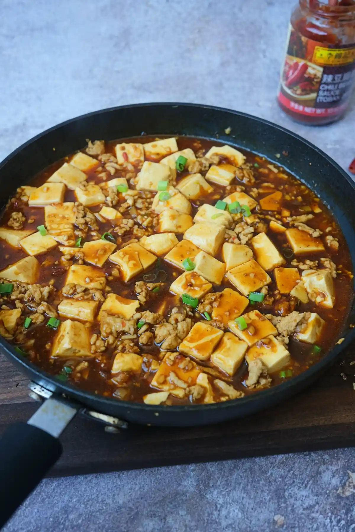 Chicken mapo tofu with silky tofu and ground chicken simmered in a spicy Sichuan sauce.