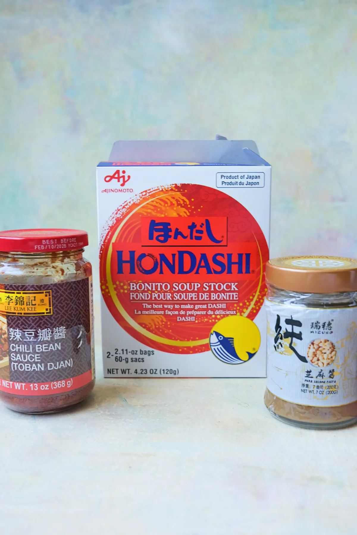 Ingredients for tantanmen ramen including sesame paste, doubanjiang, and Hondashi dashi stock