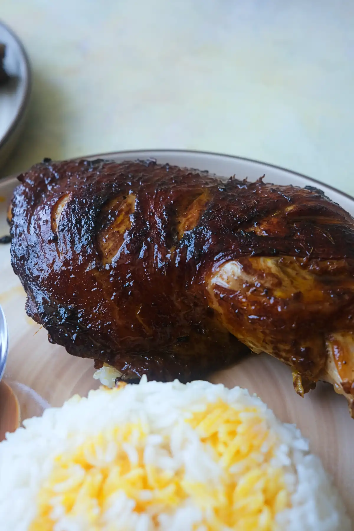 Close-up of Chicken Inasal with tender, juicy meat and signature golden-brown skin