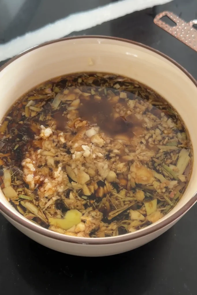 Chicken Inasal marinade made with soy sauce, vinegar, garlic, and lemongrass
