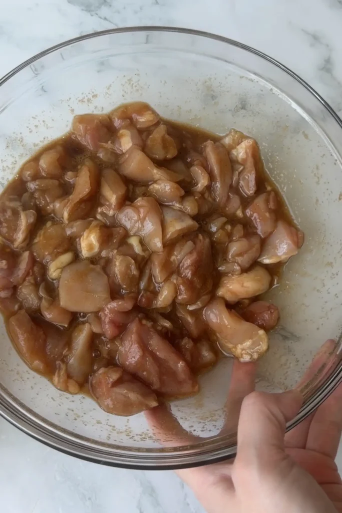 Boneless chicken thigh pieces coated in the Taiwanese popcorn chicken marinade.