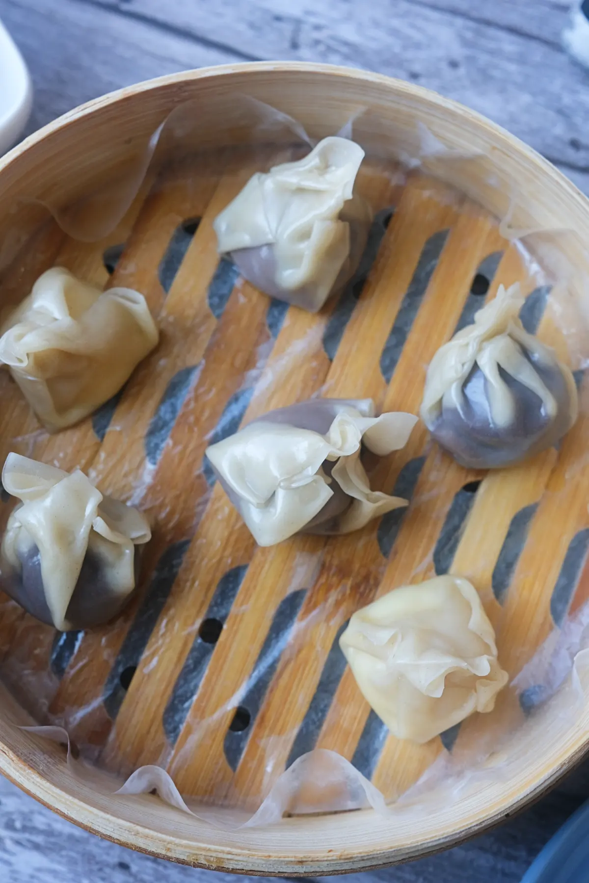 Overhead view of homemade steamed chocolate dumplings made with melted chocolate and wonton wrappers.