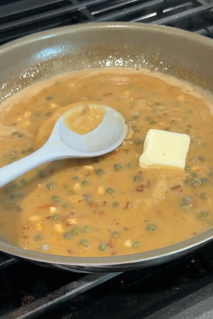 Butter added to the lemon caper sauce for salmon piccata.