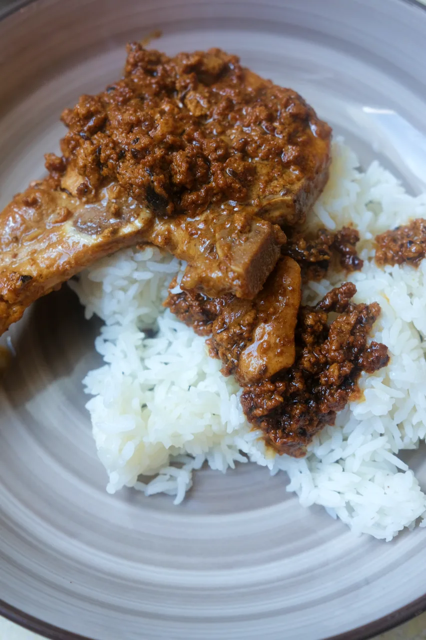 Creamy pork chops with milk curds served over steamed white rice.