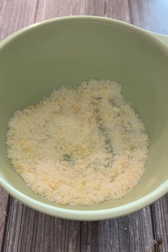 Lemon zest rubbed into granulated sugar until fragrant for invisible apple cake.