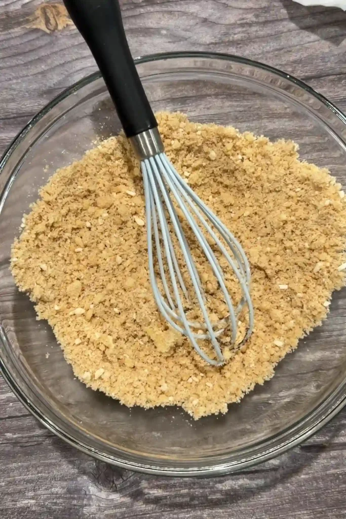Dry ingredients whisked into the apple polvoron mixture.