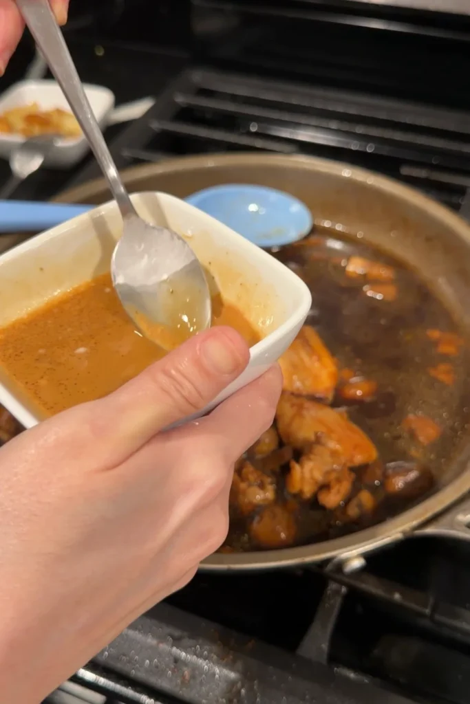 Cornstarch mixed with sauce before being added to thicken the mushroom gravy.