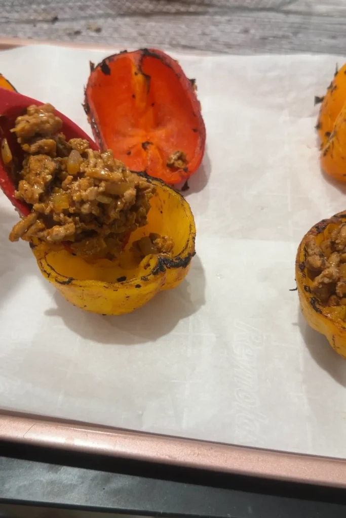 Cheesy Ground Turkey Stuffed Peppers - Crossing Kitchens